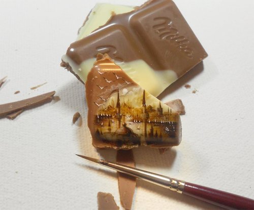 Turkish Artist Creates Micro Paintings of Istanbul on Small Pieces of Food