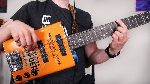 Musician Plays an Intricate Slap Solo on Oil Can Bass