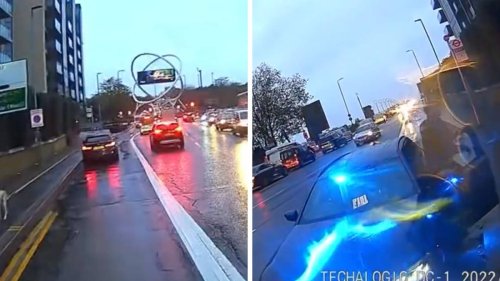 Cyclist tells car stopped in bus lane to 'get out of the f***ing way' but it turns out to be unmarked police car
