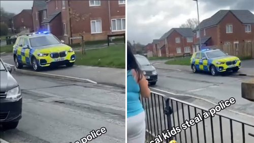 Shocking moment ‘child steals police car’ and reverses it along pavement while officer chases suspect on foot