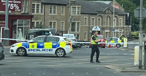 Live as crash blocks busy Leeds cross roads with emergency services on scene