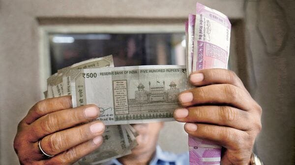 Rupee slips to a new record low of 89.85 against the US dollar amid weak flows, trade deal woes