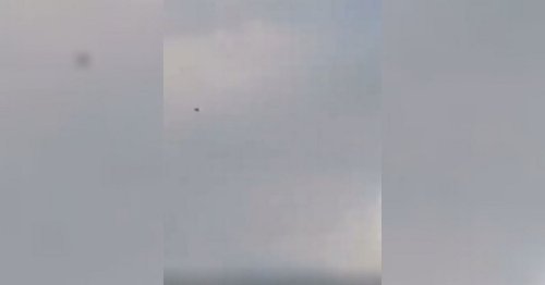 Dad spots 'UFO' flying over homes while out playing with son