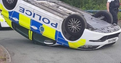 19-year-old man released after police car tipped over in Kirkby