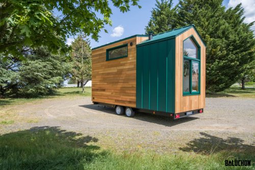 This Gorgeous Tiny House Has a Hammock Floor Under a Skylight—And It's Pure Bliss