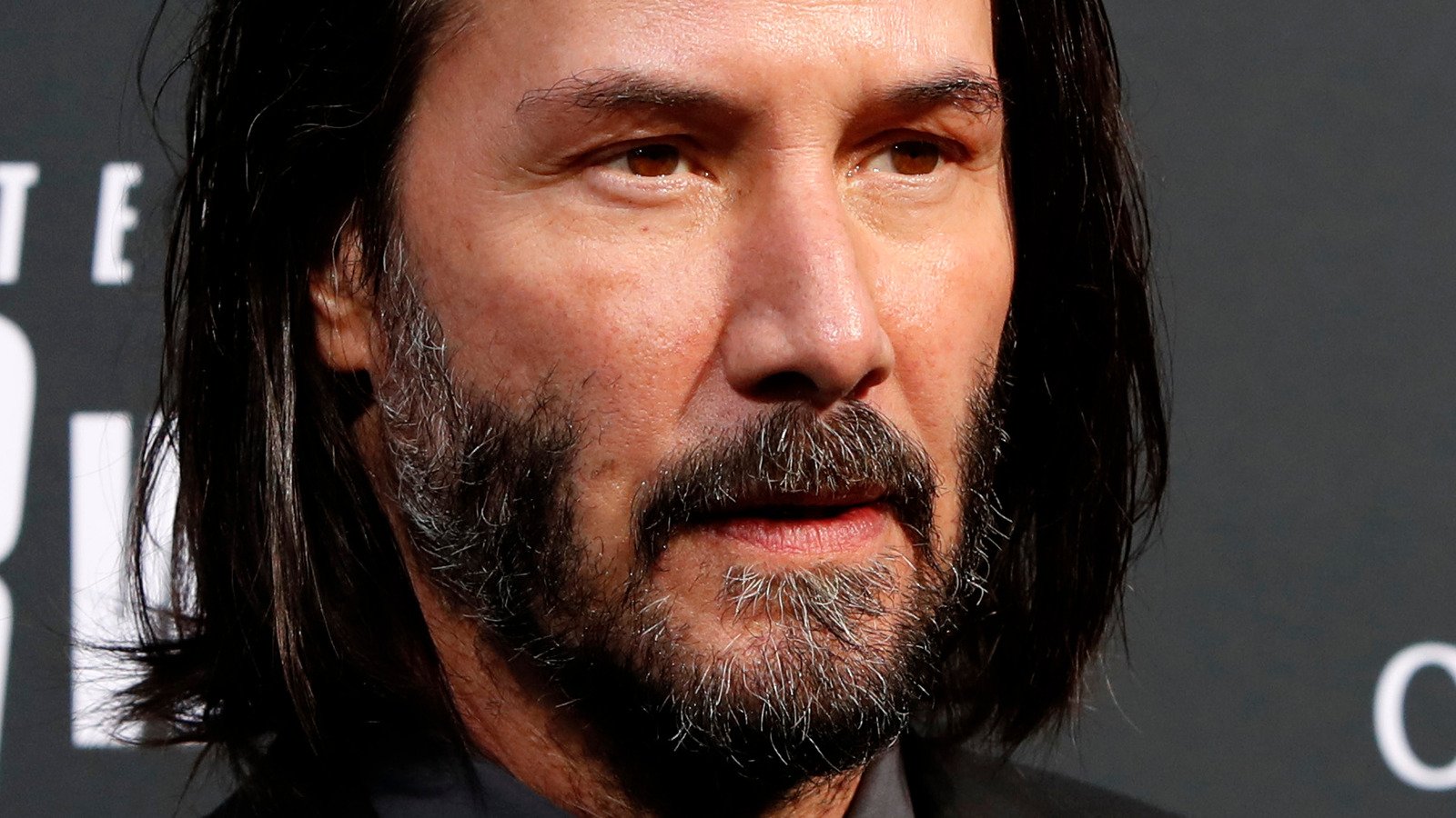 Even His Biggest Fans Have Some Pretty Harsh Opinions On Keanu Reeves' Acting - Looper