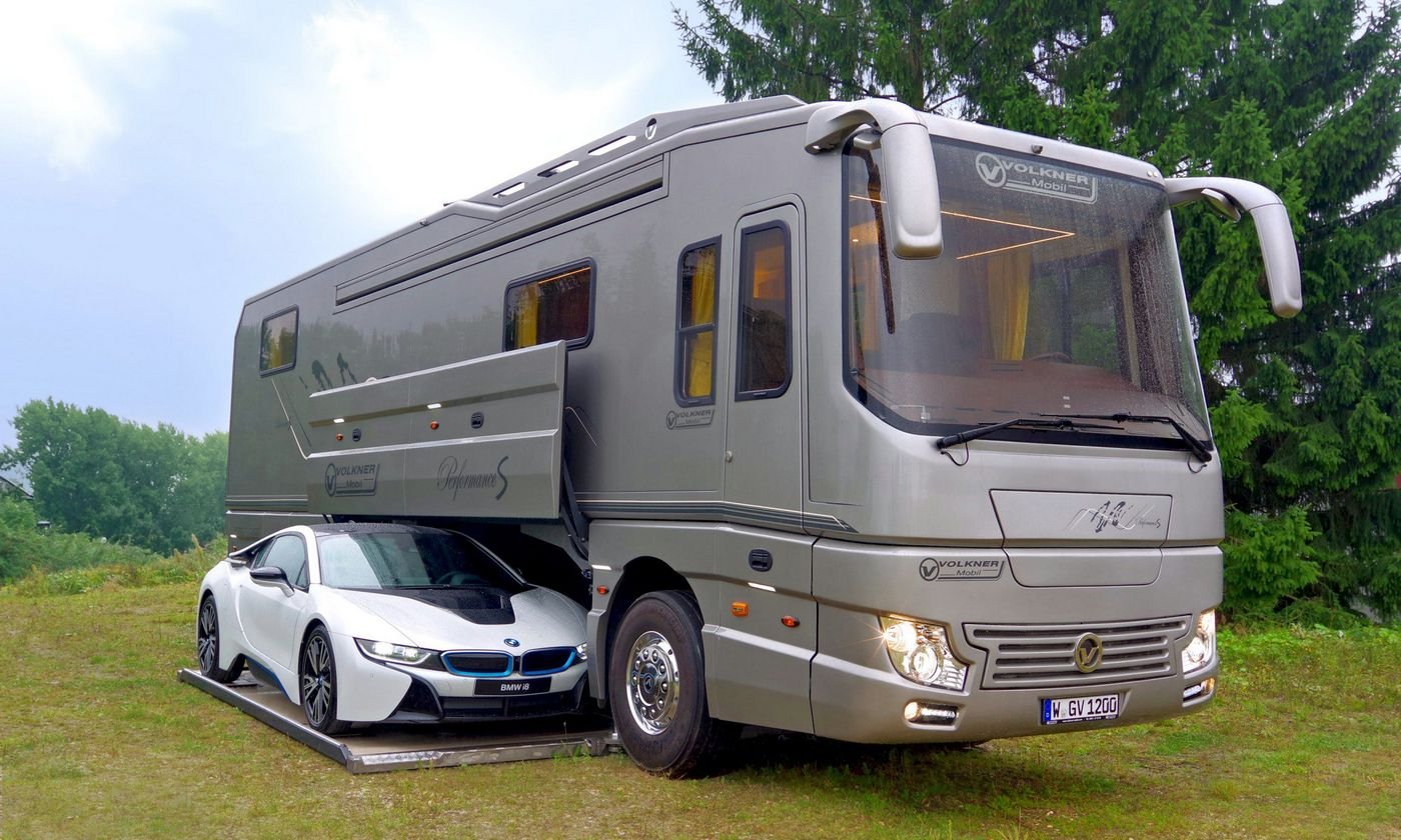 Interiors of a well-appointed penthouse and a garage for your Porsche, this $1.7 million luxury motorhome is badass