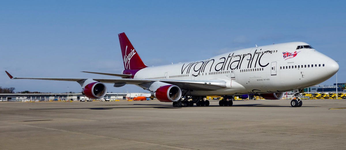The queen steps down: Virgin Atlantic bids farewell to its iconic Boeing 747 with a lavish pop-up dining experience , tour to secret areas, and souvenir pictures