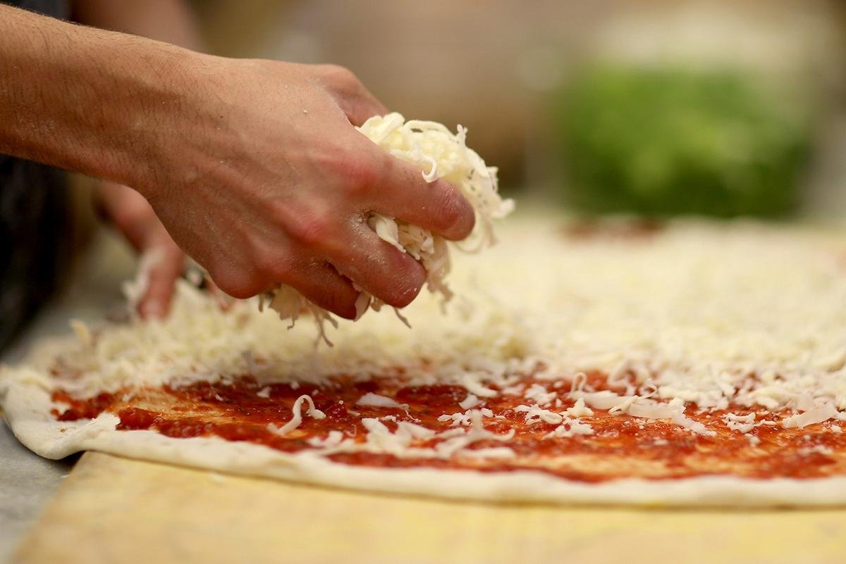 Too cheesy? French Chef sets Guinness World Record by adding 254 varieties of cheese on a pizza - Luxurylaunches