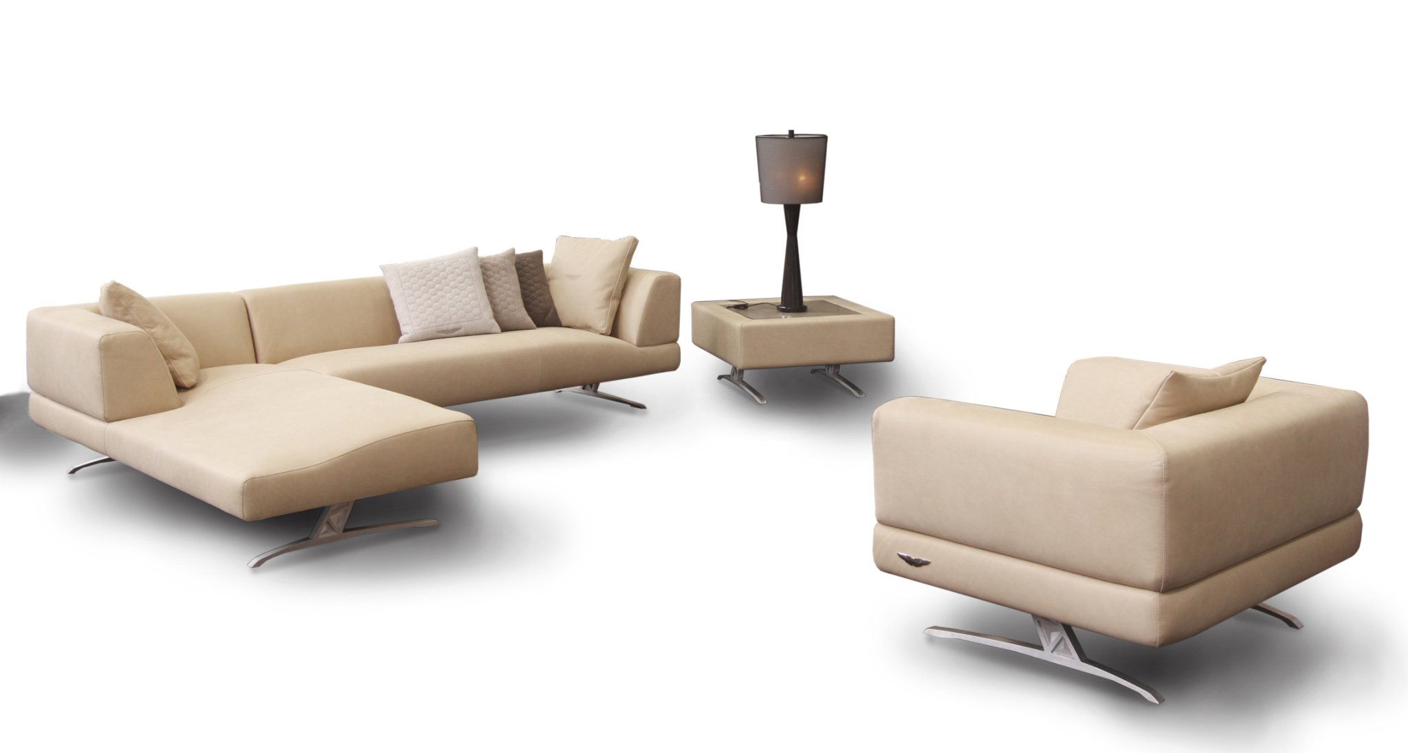 2013 Aston Martin Interiors collection's sofa and bed sport the iconic wings logo - Luxurylaunches