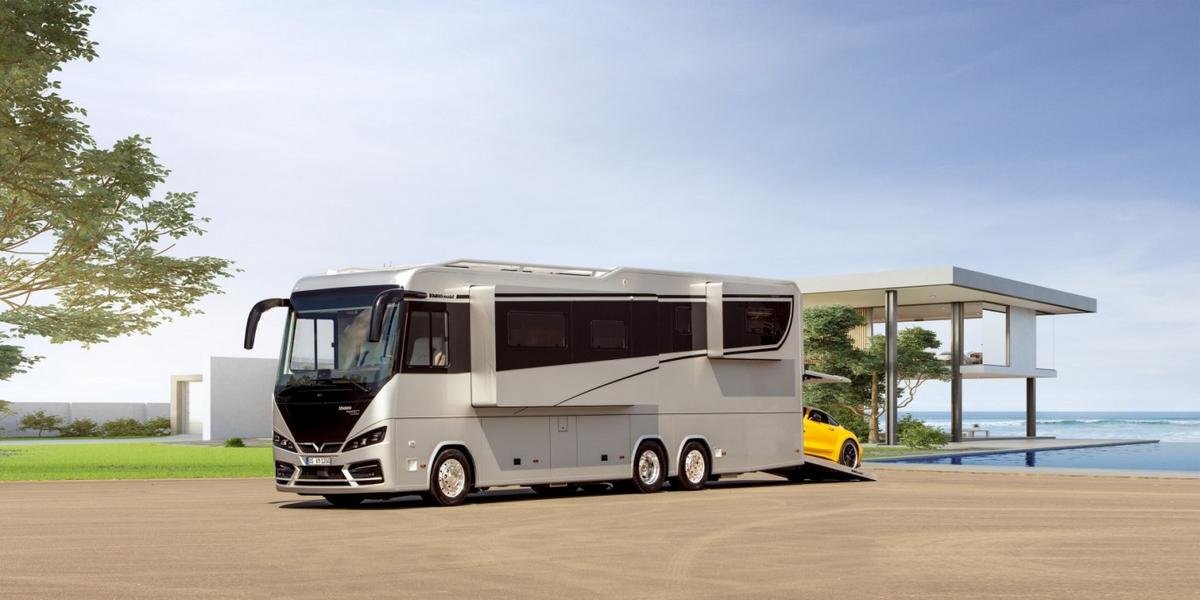 A hotel suite on wheels – Take a look inside this $1.7m luxury motorhome that comes with a full bathroom, master bedroom and a garage for your supercar