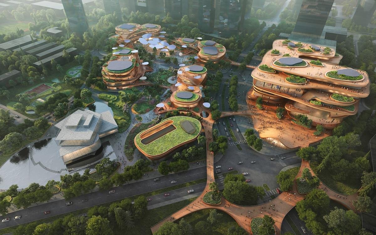 Resembling a futuristic level of Donkey Kong – The Chinese city of Shenzhen is developing an urban, sustainable hub that includes a theater, library, museum, and retail shops, with lots of green patches