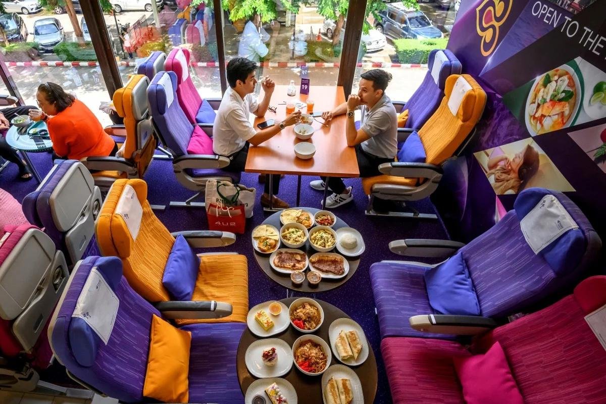 An ideal spot for those who miss flying – Thai Airways has opened an airplane-themed café