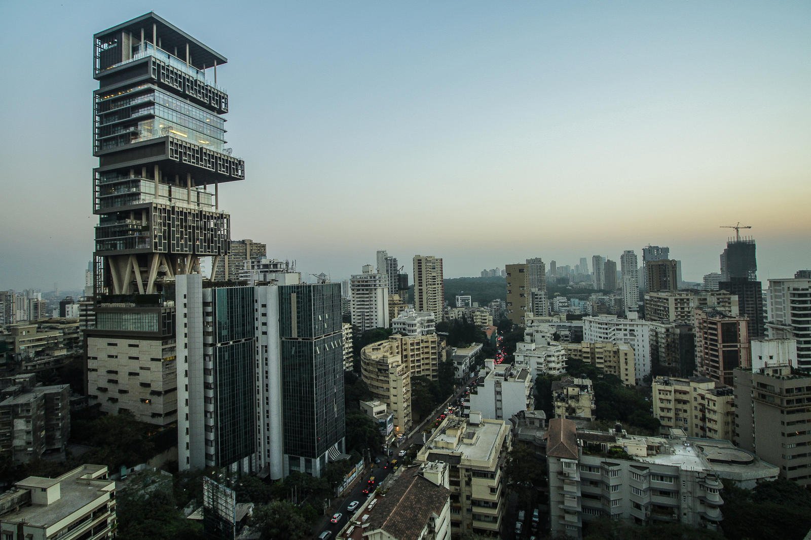 Indian billionaire Mukesh Ambani to install rotating beds and retractable roofs in his $4.7 skyscraper home so his grandkids can soak in the morning sun – To mark their births the joyous businessman will donate 300 kgs of gold to charities.