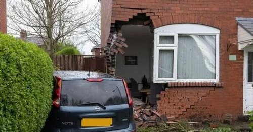 'It was absolute madness': Neighbours recall moment car ploughed into house leaving man, 20, seriously injured