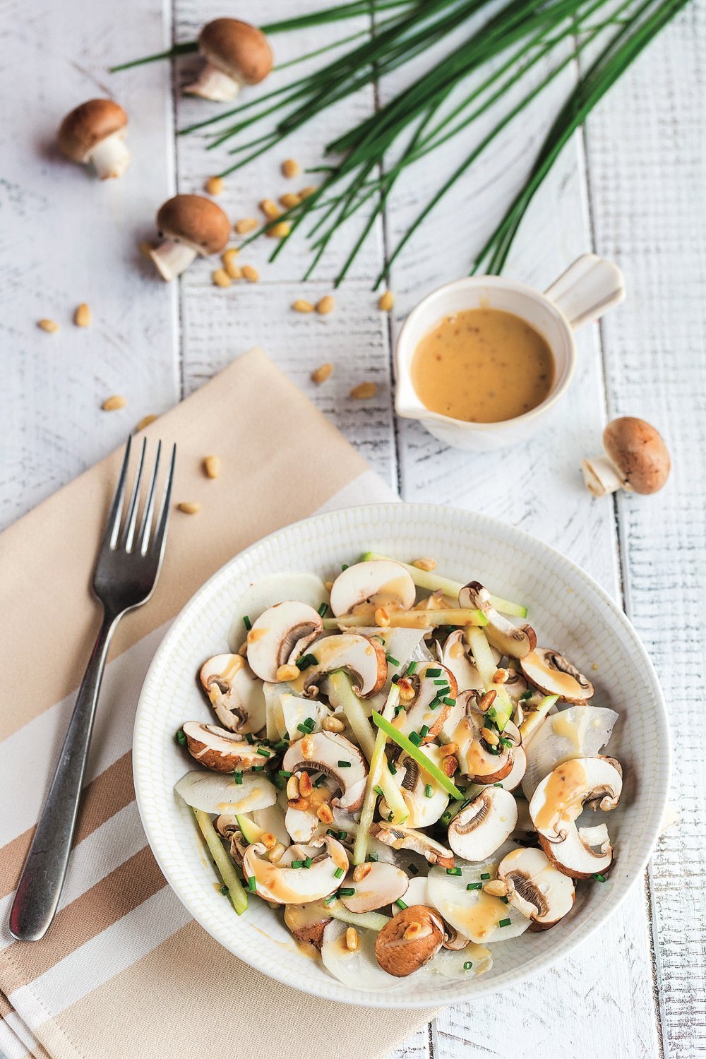 Salade de champignons au praliné de pignon