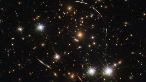 NASA’s Hubble Captured A Dozen Clones Of The Sunburst Arc Galaxy
