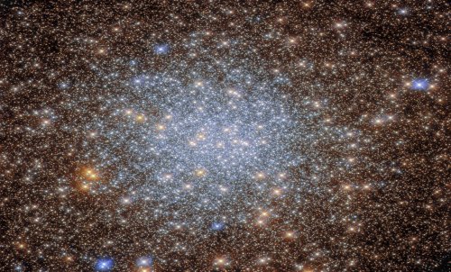 NASA's Hubble Space Telescope Captures Gleaming Image Of A Global Cluster Containing Millions Of Luminous Stars
