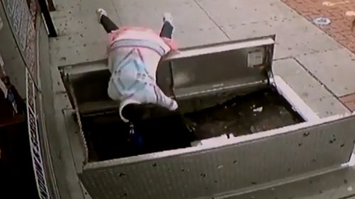 Woman fell into an open hatch because she was too busy looking at her phone