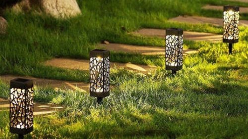 Enhance your outdoor space with solar garden lights — a 4-pack is on sale for just $25
