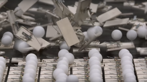 Watch as ping-pong balls and mouse traps illustrate the power of social distancing