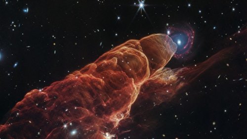 Webb reveals that's no star over there. It's an entire freaking galaxy.