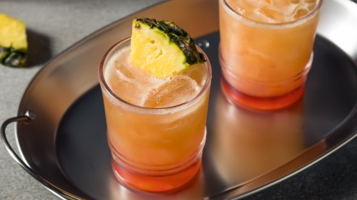 The Fascinating Origins Of The Rum Swizzle Cocktail