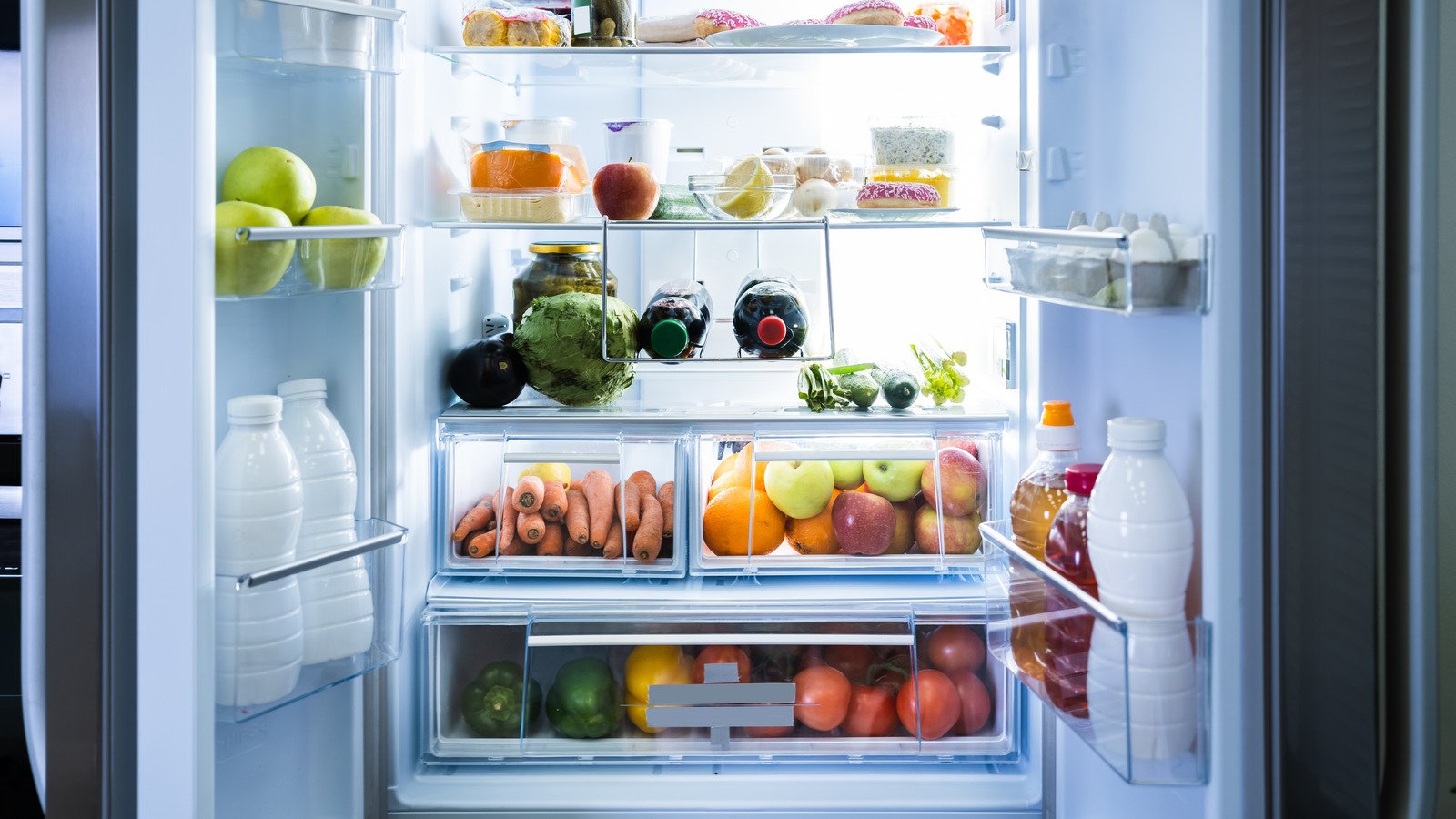 The Reason You Should Store Soda In The Refrigerator Door
