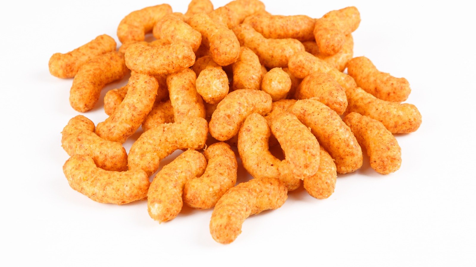 You Might Not Know The Real Name Of Cheetos' Cheesy Dust - Mashed