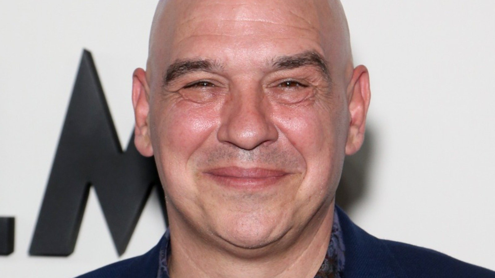 Why Michael Symon Doesn't Wash Raw Chicken Before Cooking It