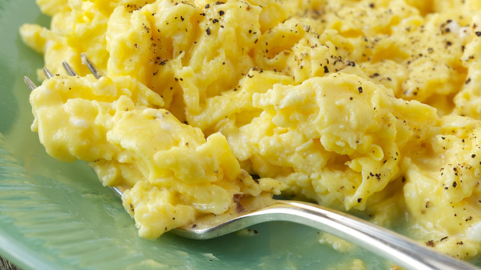 Why You Should Be Adding Cream Instead Of Milk To Scrambled Eggs