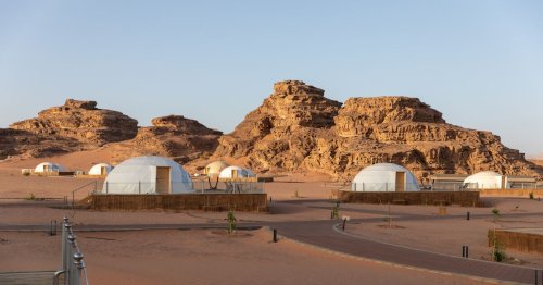 Sleep in Bedouin Tents, Eat Traditional Jordanian Food, and Ride Camels at the Mazayen Rum Camp