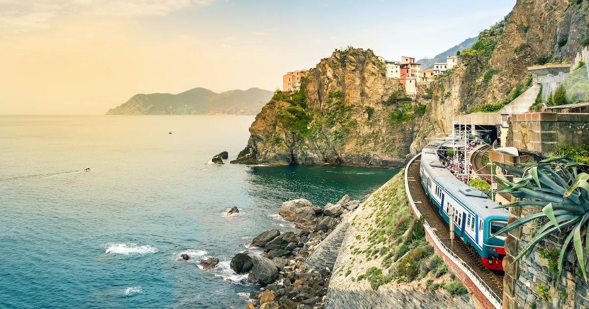 6 Spectacular Italian Train Journeys Through Olive Groves, Cinque Terre, and Venice