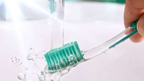 Your Toothbrush Is Teeming With Bacteria: Dentists Share How to Clean It