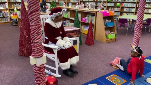 Santa visits the Martin Luther King Elementary School students for breakfast