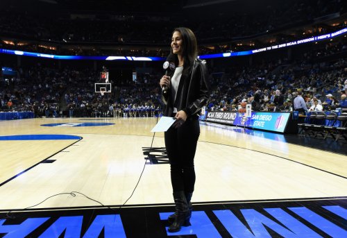 Sideline Reporter's Photo With 7-Foot-9 Basketball Player Turn Heads During NCAA Tournament