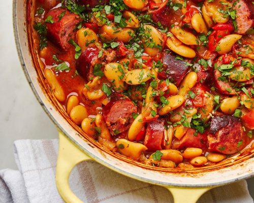 This rustic dish of baked beans and smoked sausages is packed with deep, aromatic flavors