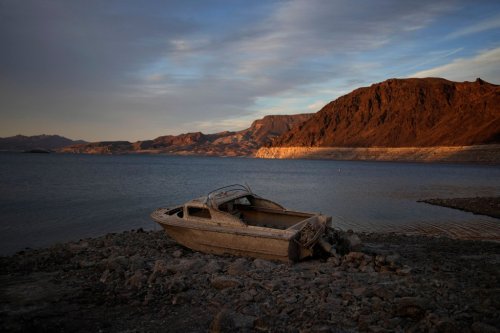 Previously sunken boats are emerging at Lake Mead as water level hits historic low