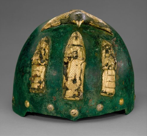 Helmet with divine figures beneath a bird with outstretched wings ca. 1500–1100 B.C.