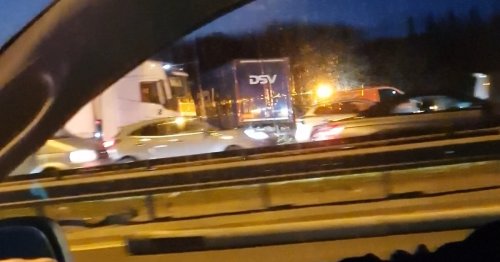 Several injured after lorry smashes through motorway reservation into six vehicles