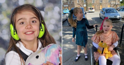 Girl in a wheelchair removed from school picture by photo firm