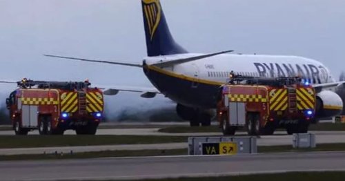 Ryanair plane swarmed by fire crews after touching down in UK