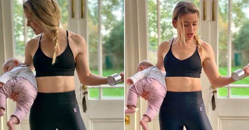 Amber Heard has multitasking down to a fine art as she works out with her baby