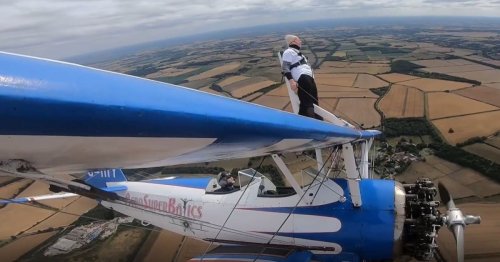 Daredevil pensioner, 93, gets strapped to plane and does loop-the-loop in the sky