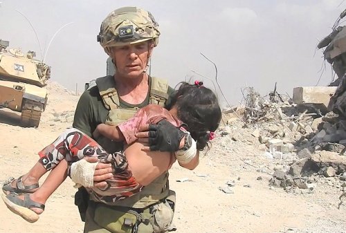 Video emerges of hero running through gunfire to rescue girl trapped by Isis