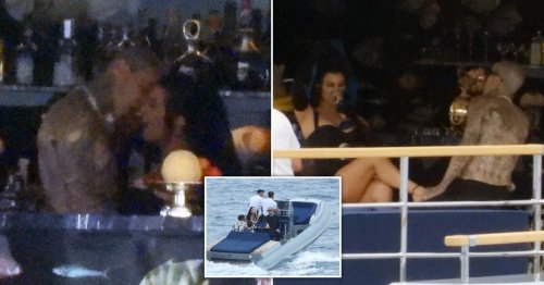 Kourtney Kardashian and Travis Barker pack on PDA on idyllic yacht trip hours before wedding ceremony