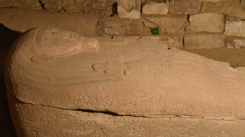 Hidden room — with ancient pink sarcophagus — emerges from sand-filled tomb in Egypt
