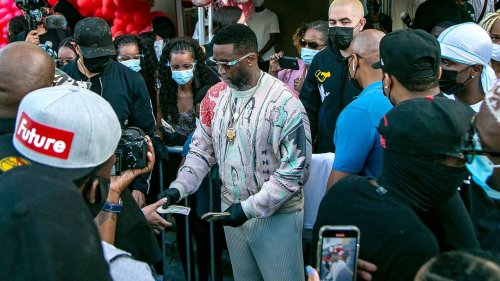 See Diddy give away money in Miami and promote his clothing at a Pembroke Pines mall