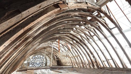 Hidden paintings discovered under plaster in 13th-century church in France. See them