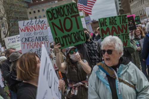 Hundreds march at the Michigan Capitol against Trump policies, part of nationwide protests
